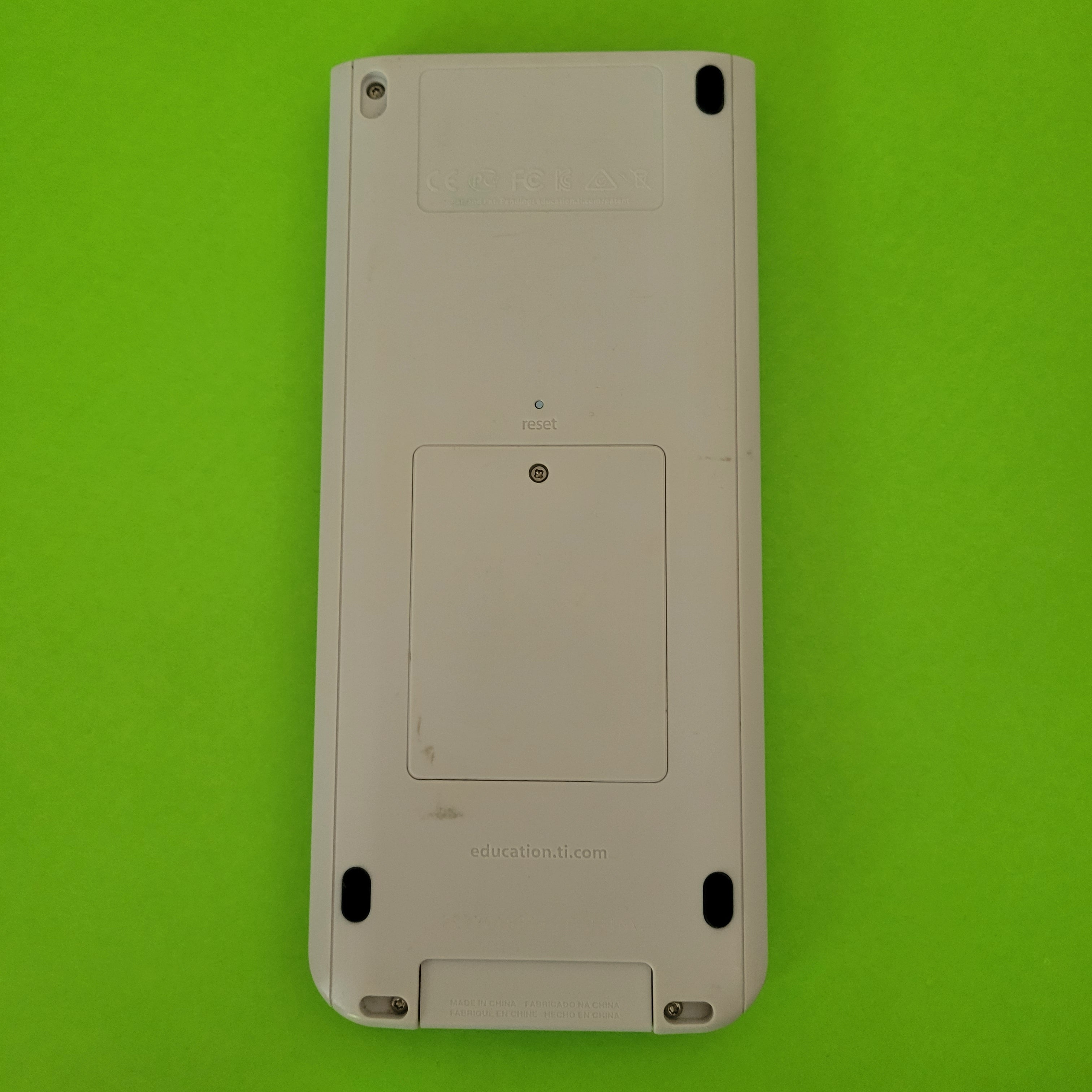 An image of the back of a texas instruments ti nspire cx symbolic calculator